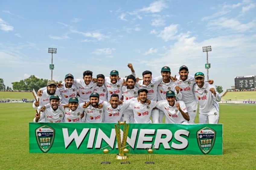 Bangladesh's players celebrate after winning the second Test on Tuesday to take the series