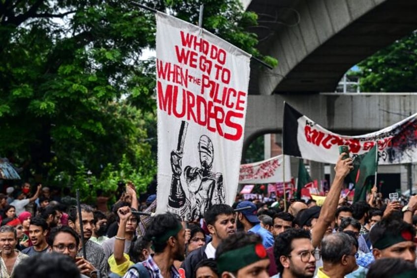 Activists marching in Dhaka to call for justice for those killed in the recent countrywide