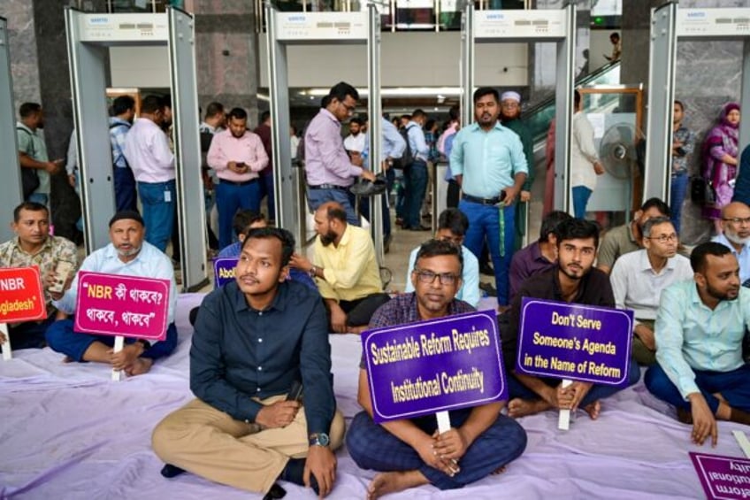 National Board of Revenue (NBR) employees protest in front of Bangladesh's NBR office in D
