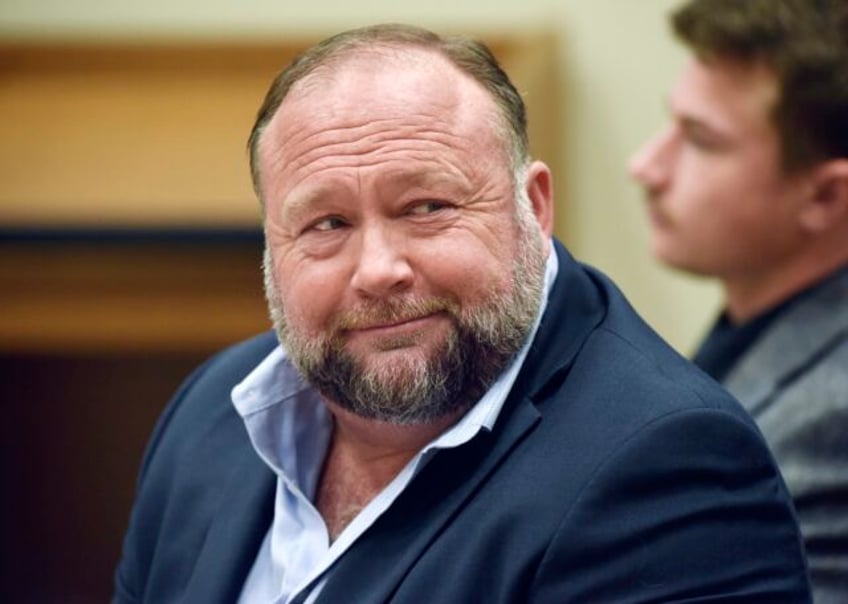 bank that handles infowars money appears to be cutting ties with alex jones company lawyer says