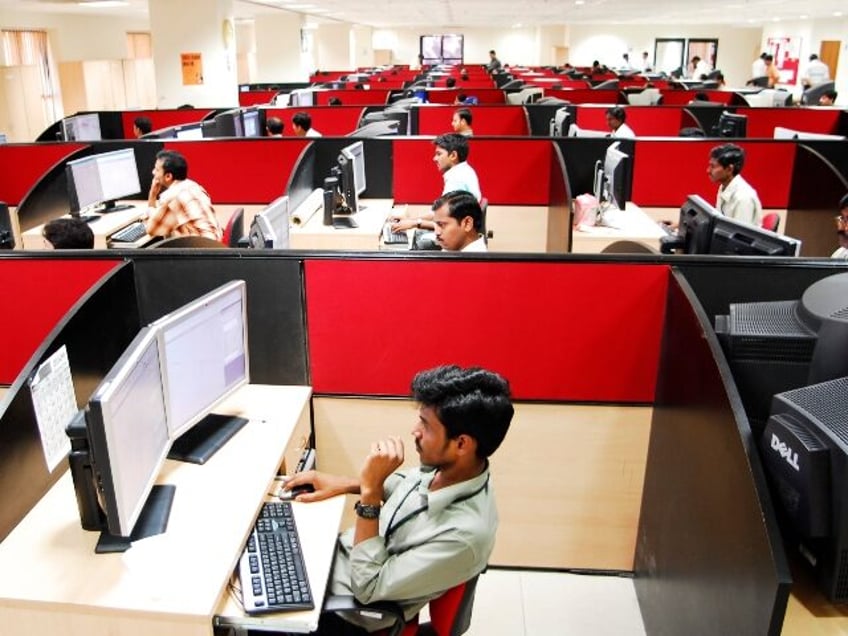 Indian office workers pretending to be AI