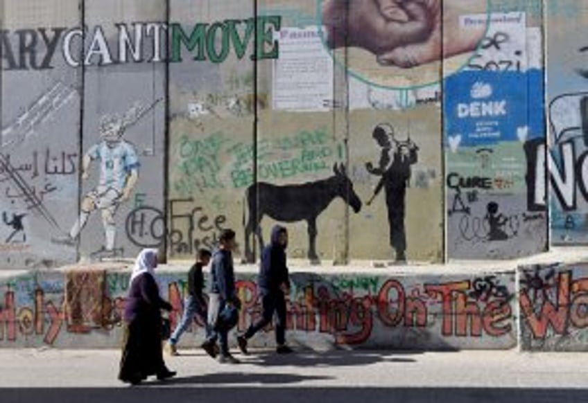 Banksy claims new graffiti with rare, apparent self-reflection