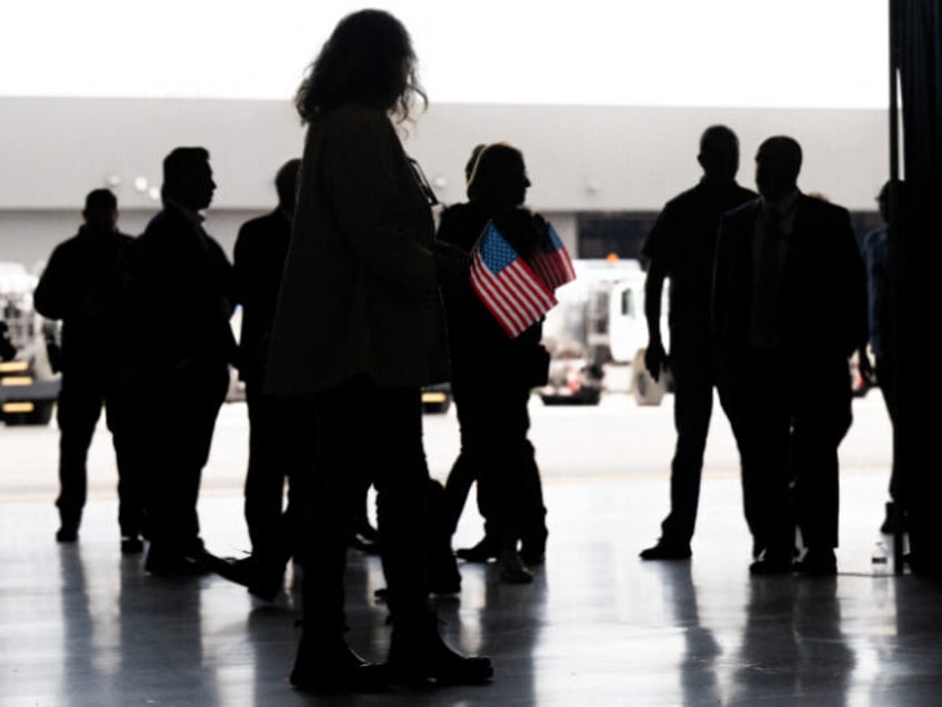 The first group of Afrikaners from South Africa to arrive for resettlement listen to remar