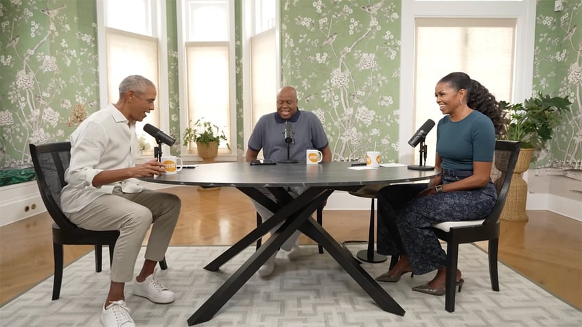 Barack and Michelle Obama and Craig Robinson