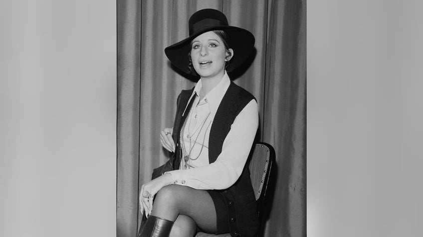 American singer and actress Barbra Streisand at a reception