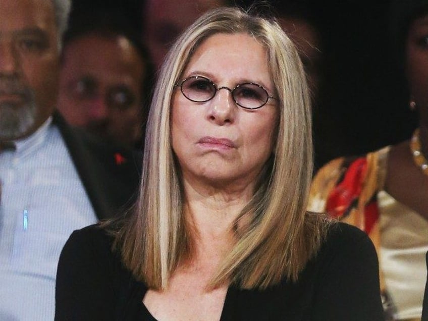 NEW YORK, NY - SEPTEMBER 25: Singer Barbra Streisand listens as Egyptian President Mohamed Morsi speaks at the Clinton Global Initiative meeting on September 25, 2012 in New York City. Timed to coincide with the United Nations General Assembly, CGI brings together heads of state, CEOs, philanthropists and others to …