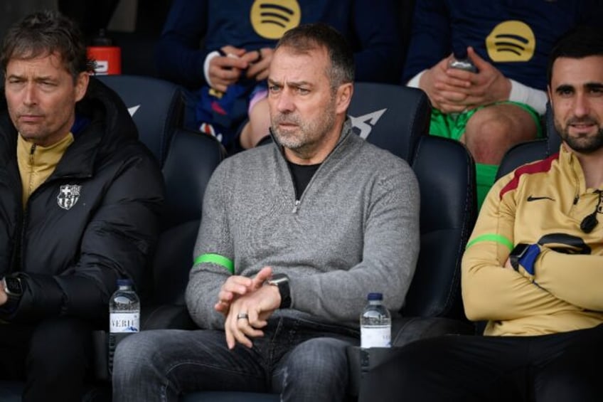 Barcelona coach Hansi Flick (C) said his team would not hide behind excuses and complaints
