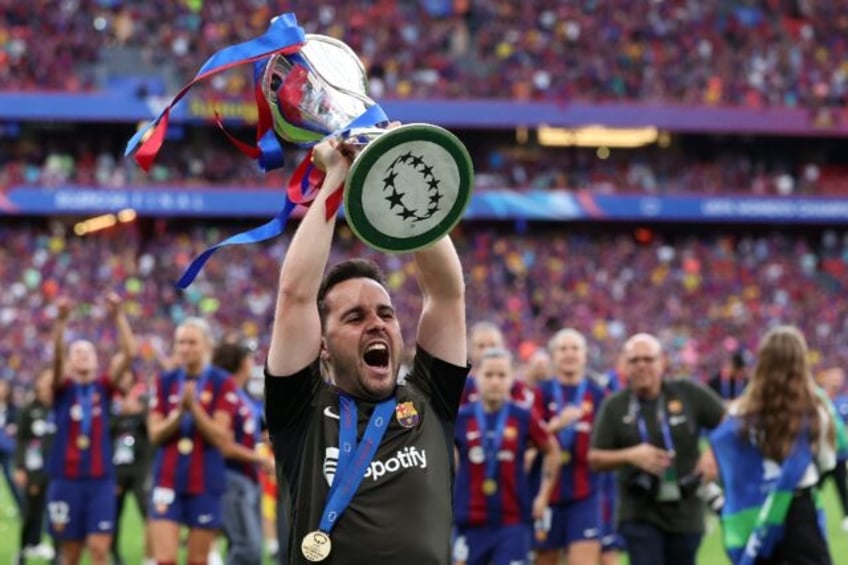 Barcelona's Spanish coach Jonatan Giraldez celebrates after winning women's Champions Leag