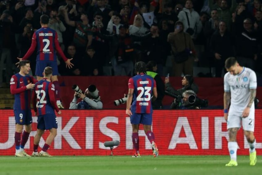 Barcelona's Portuguese defender Joao Cancelo celebrates scoring his team's second goal as