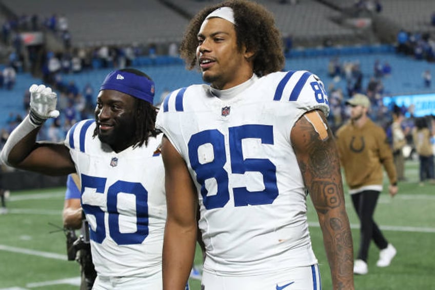 Indianapolis Colts linebacker Segun Olubi and Indianapolis Colts tight end Andrew Ogletree during a NFL football game between the Indianapolis Colts...