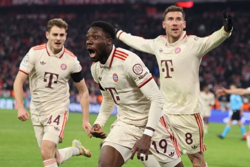 Alphonso Davies runs off in celebration after scoring the late goal which took Bayern Muni