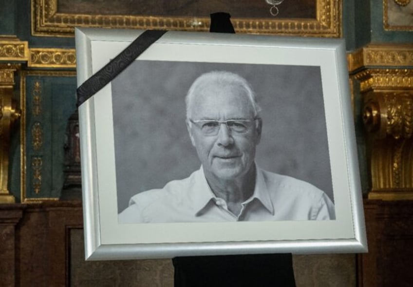 A black and white picture of German football legend Franz Beckenbauer is on display at the Hofkapelle in Munich