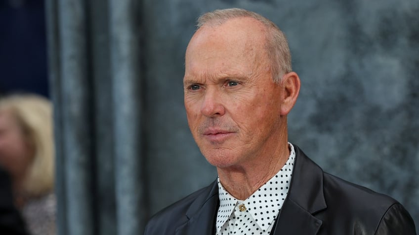 Michael Keaton attends a premiere