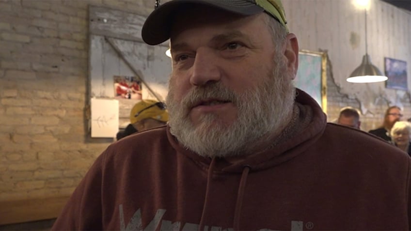 Lou, a male Iowa resident wearing a baseball cap and hoodie speaks to Fox News about Vivek Ramaswamy