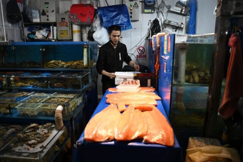 beijing fishmongers worry as japan begins fukushima water release