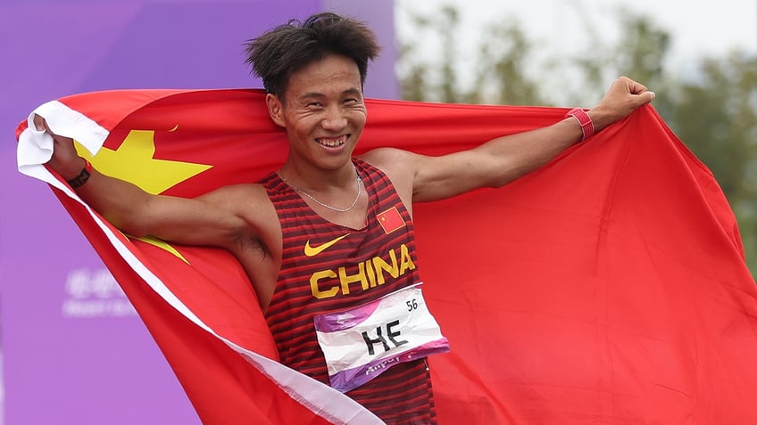 He Jie celebrates