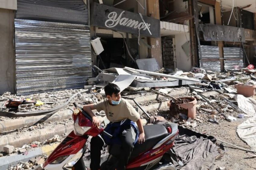 Many shops in Beirut's southern suburbs have been damanged or destroyed by Israeli bombard