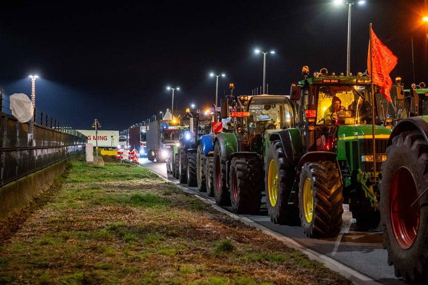 Farmers and their tractors gather for a protest action near quai 730 in the port of Antwerp, organized by several agriculture unions, Tuesday 13 February 2024 in Antwerp. Farmers' protest across Europe as they demand better conditions to grow, produce and maintain a proper income. BELGA PHOTO JONAS ROOSENS (Photo by JONAS ROOSENS / BELGA MAG / Belga via AFP) (Photo by JONAS ROOSENS/BELGA MAG/AFP via Getty Images)