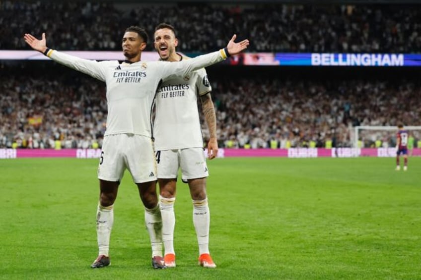 Real Madrid's English midfielder Jude Bellingham celebrates scoring his team's Clasico win