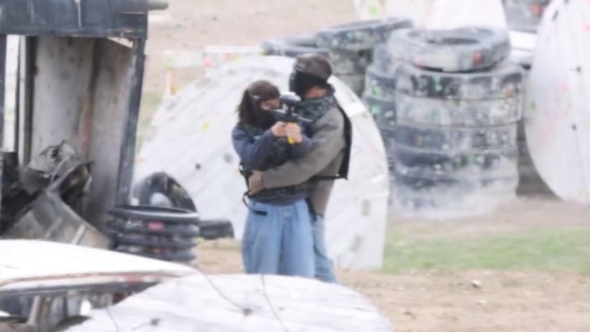 Ben Affleck hugs Jennifer Garner during paintball