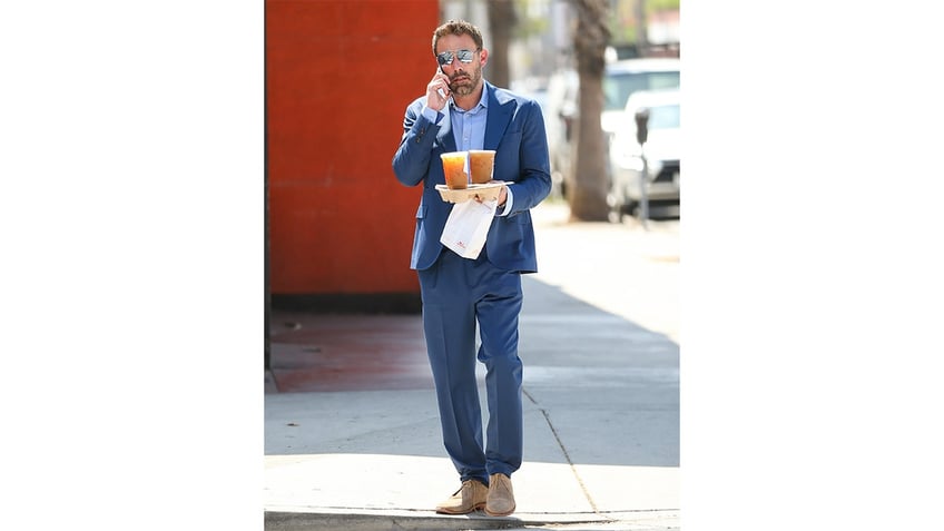 Ben Affleck carries Dunkin coffee