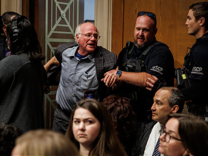 WASHINGTON, DC - MAY 14: Ben Cohen, co-founder of Ben and Jerry's, is detained by U.S. Cap