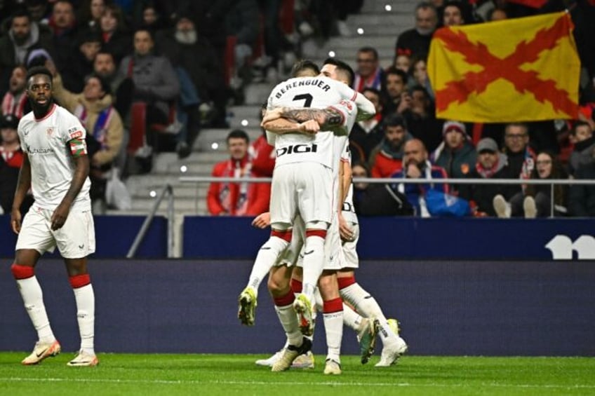 Athletic Bilbao forward Alex Berenguer celebrates scoring the opening goal from the penalt