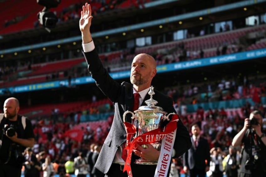 Manchester United manager Erik ten Hag holds the FA Cup