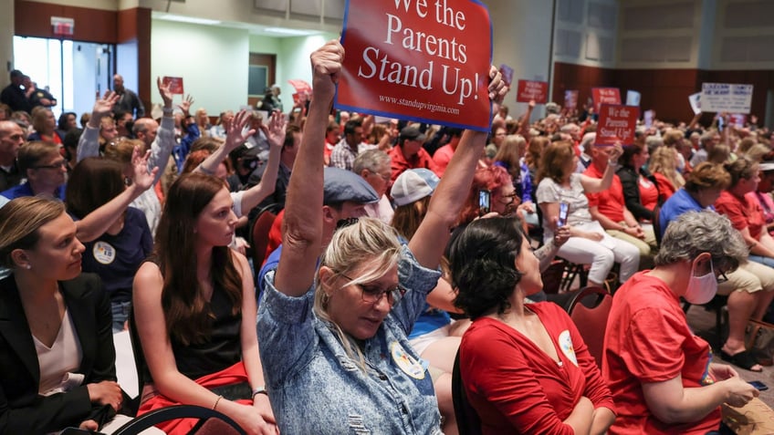 Parents at school board meeting in Ashburn, Virginia.