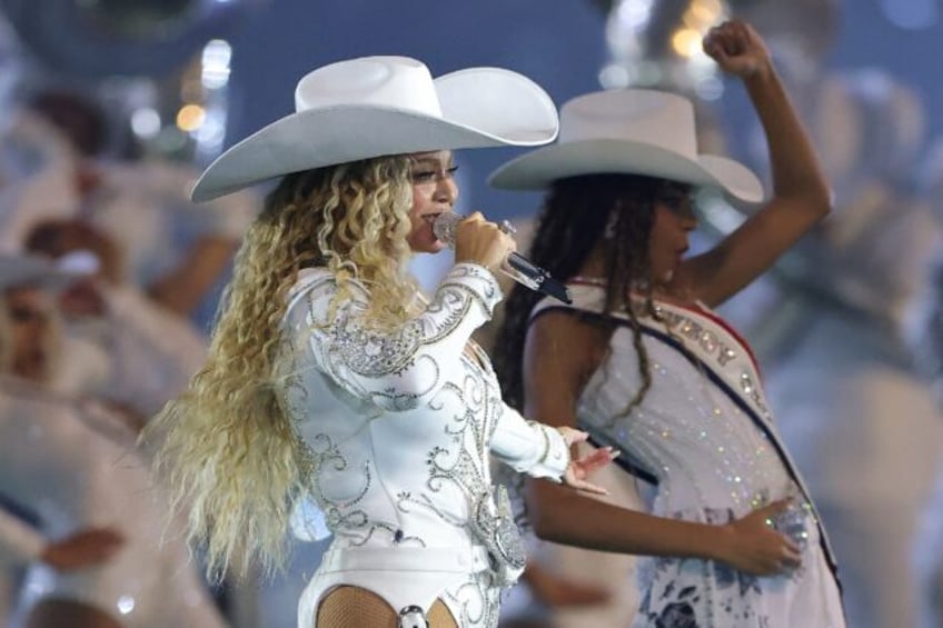 Beyonce, shown here performing with her daughter Blue Ivy during an NFL game on Christmas