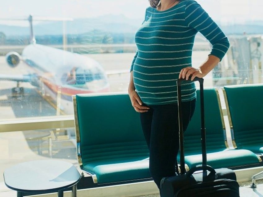 Pregnant woman airport (Getty Images)
