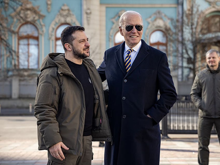 President Joe Biden walks with Ukrainian President Volodymyr Zelenskyy, Monday, February 2