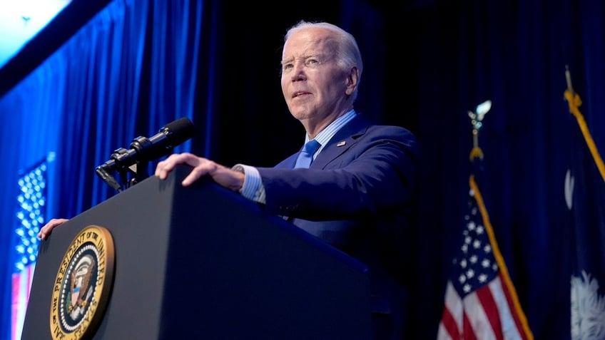 President Biden speaking at podium