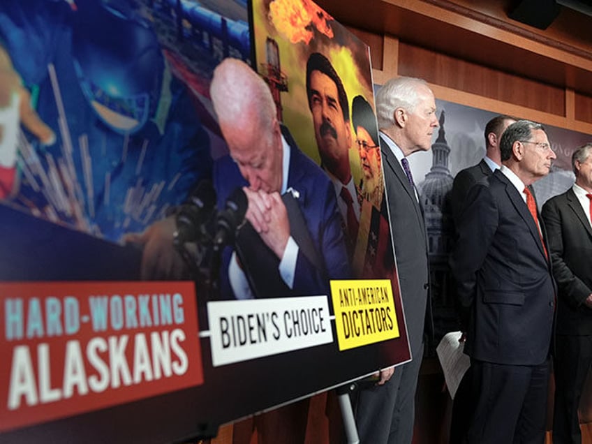 Sen. Dan Sullivan, R-Alaska, center, with several of his Senate colleagues discuss during