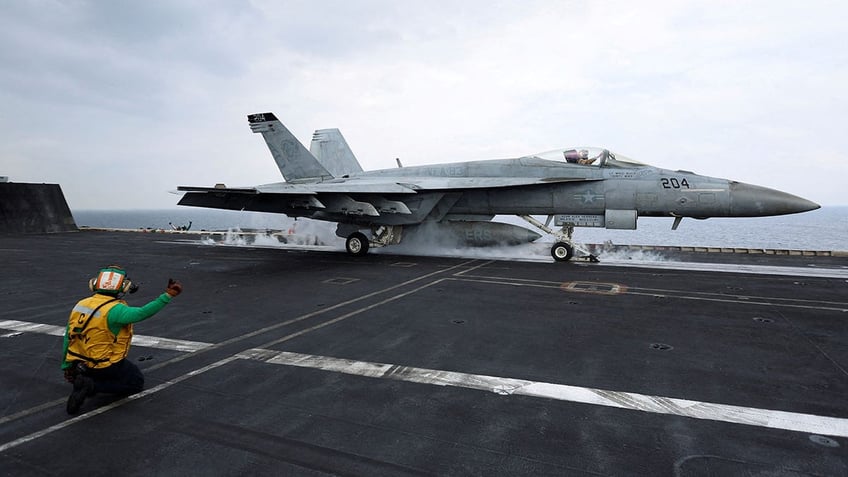 A Navy fighter jet pictured on the USS Dwight D. Eisenhower 