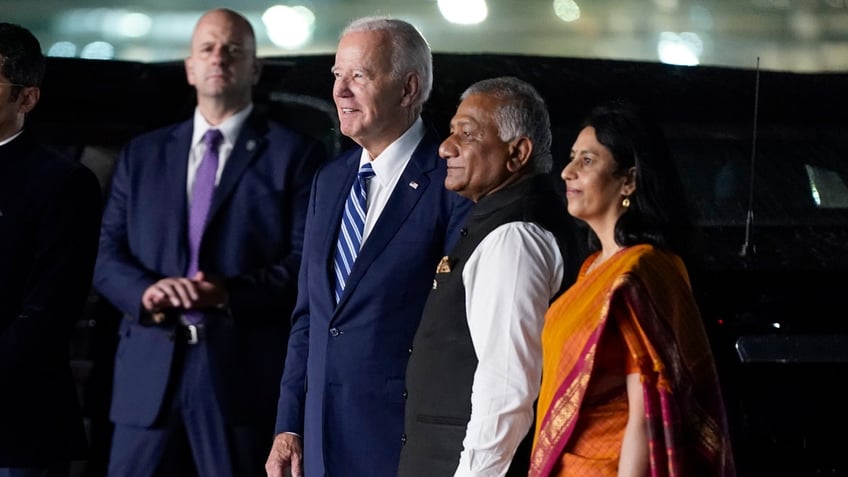 biden arrives in india for g 20 summit as foes putin and chinas xi keep away