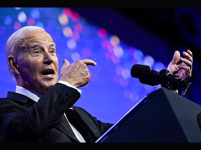 biden at human rights campaign dinner who in gods name needs a weapon with 100 rounds in the chamber