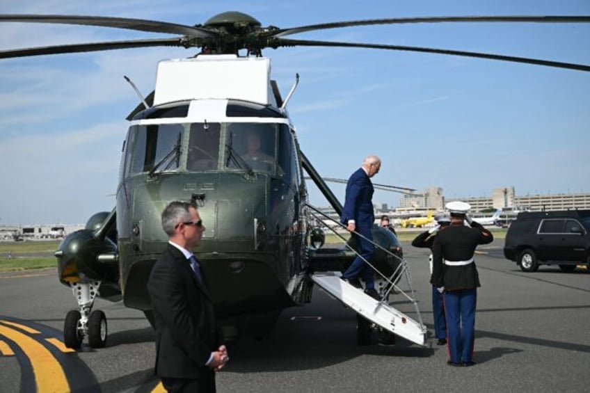 US President Joe Biden steps off Marine One upon landing at Philadelphia International Air