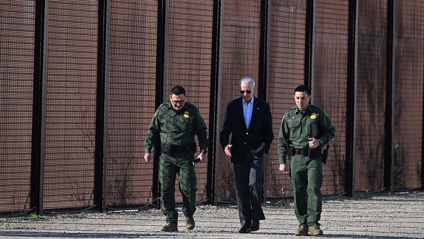 Biden walking with border officers