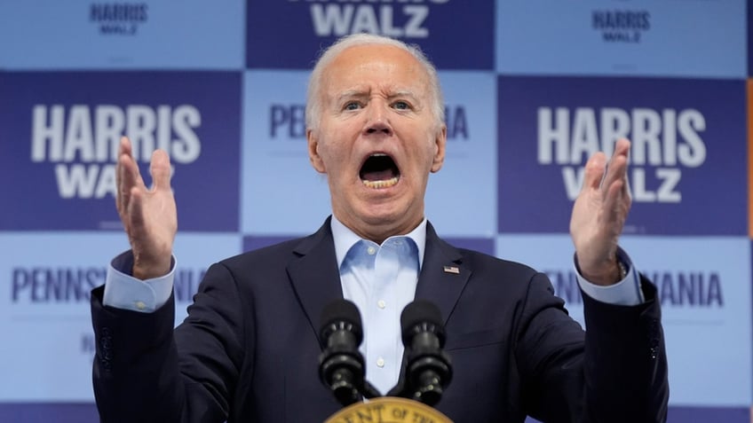 President Joe Biden shouts during an election campaign event in Pittsburgh, Saturday. 