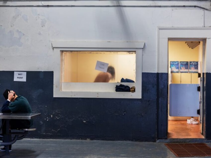 New Bedford, MA - February 2: An inmate showers at the Ash Street Jail. (Photo by Stan Gro