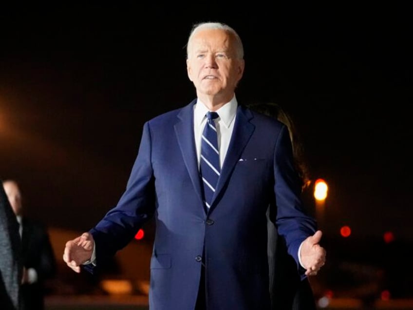 President Joe Biden speaks with reporters after greeting reporter Evan Gershkovich, Alsu K