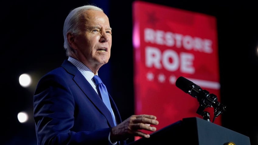 Biden speaking at podium