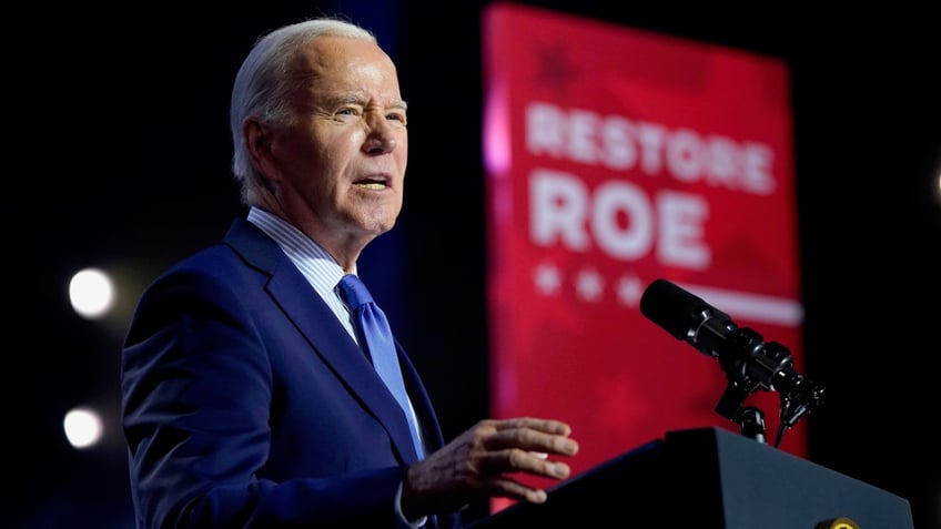 Biden speaking at podium