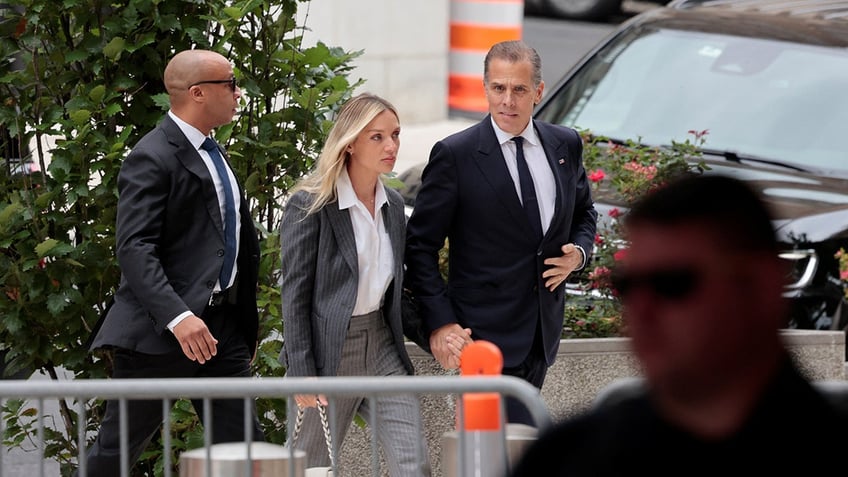 Hunter Biden and Melissa Cohen Biden arrive at federal court