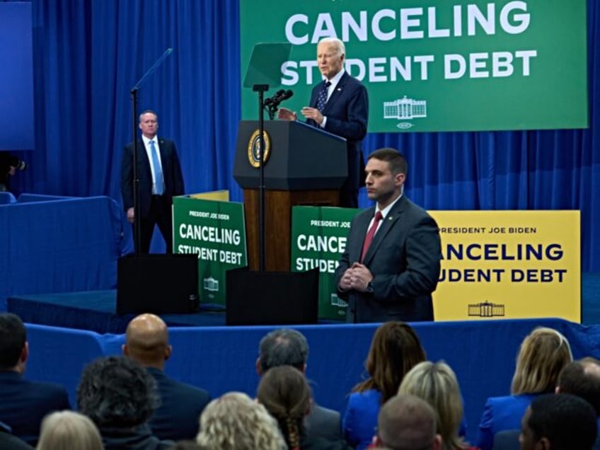 US President Joe Biden, center right, speaks during an event in Madison, Wisconsin, US, on