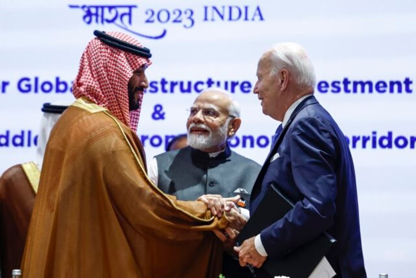 biden gives saudi crown prince mohammed a hearty handshake a year after an awkward fist bump moment