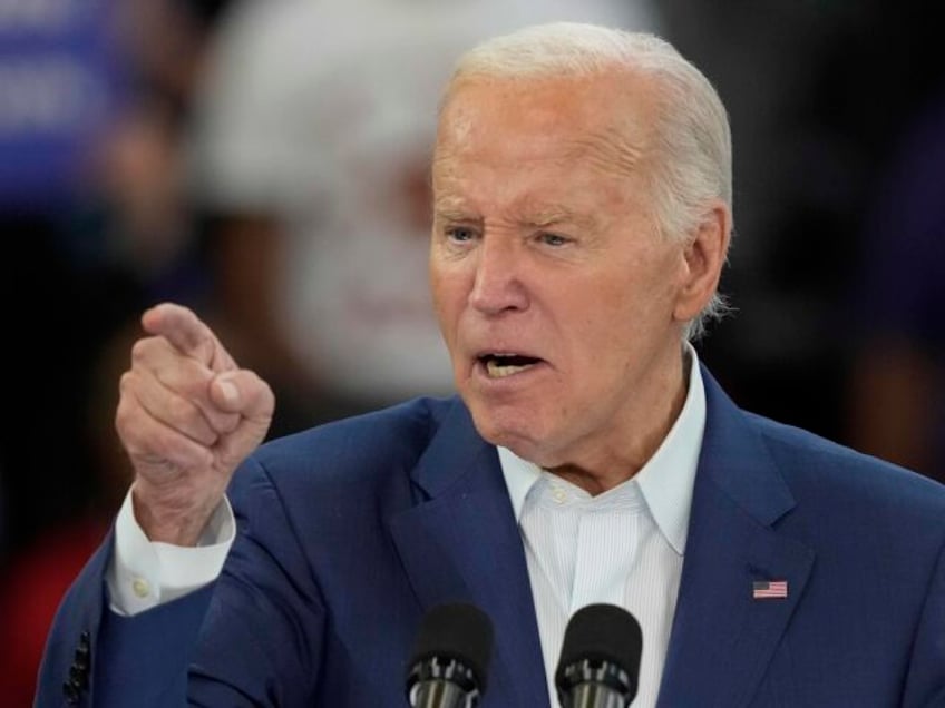 Joe Biden in Michigan accusing (Carlos Osorio / Associated Press)