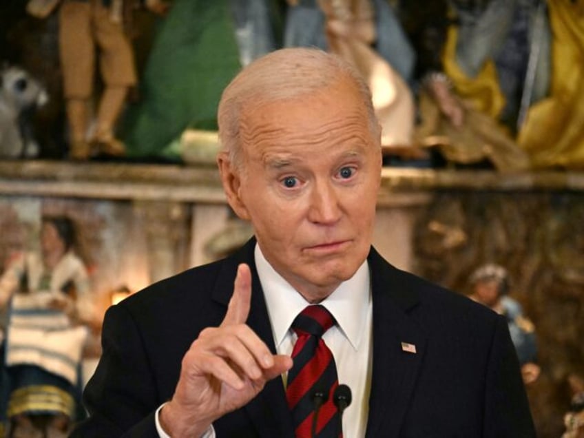 US President Joe Biden speaks at a Christmas for All Dinner in Celebration of Unity, Ameri