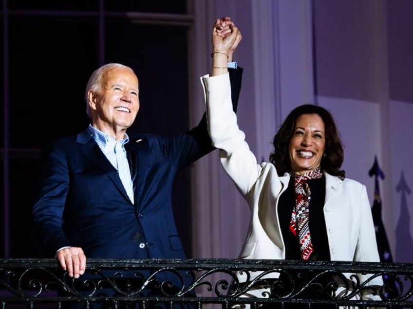 US President Joe Biden, left, and Vice President Kamala Harris on the Truman Balcony of th